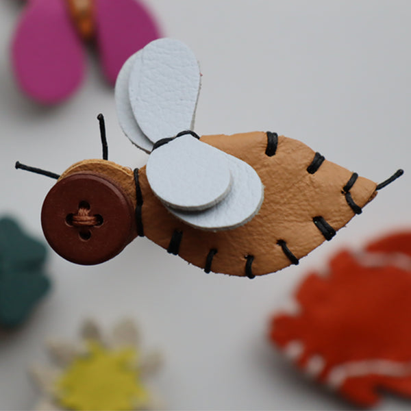 ANSTECKER HUMMEL